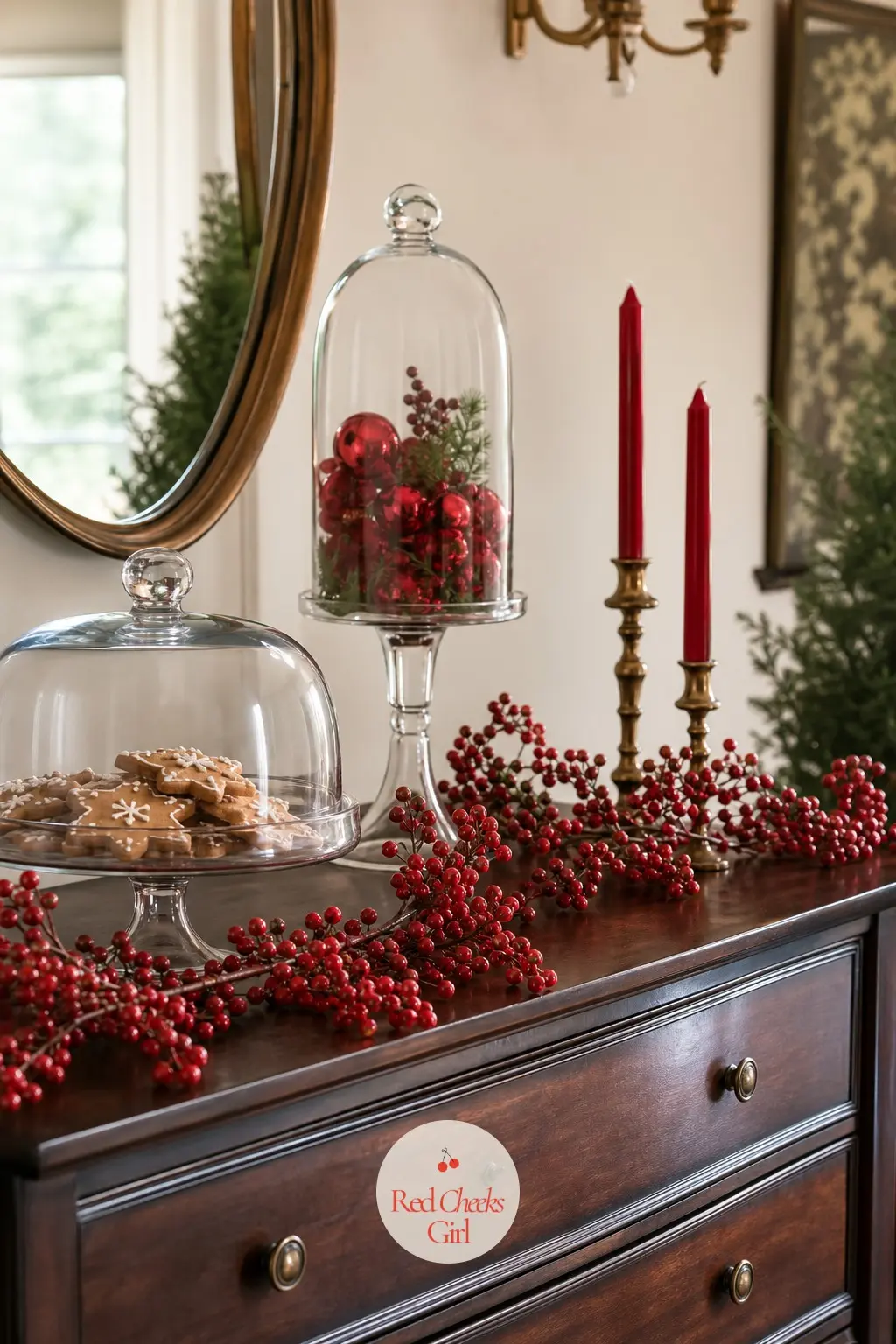 The Sideboard, Dressed With Berry Garland and Glass Cake Domes — The sideboard is where the overflow dishes and desserts live, so it needs height more than