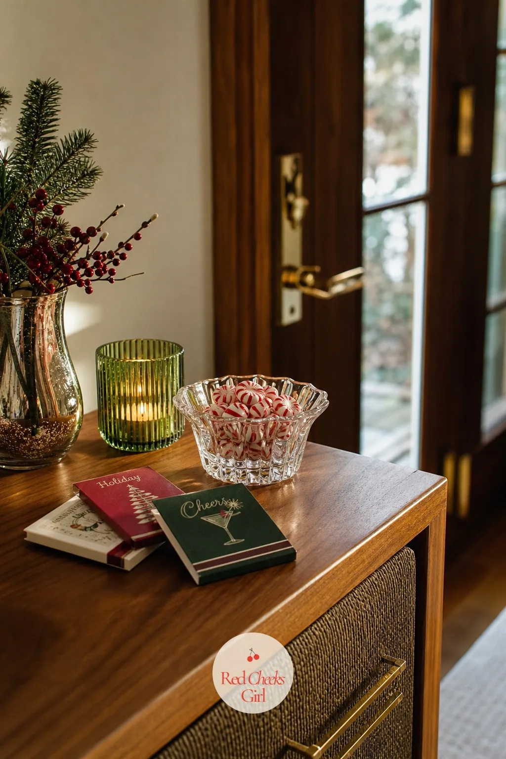 The Matchbook and Candy Dish by the Door — A small dish by the entry console, the same one holding keys and nuts earlier in the evening, gets refilled near the