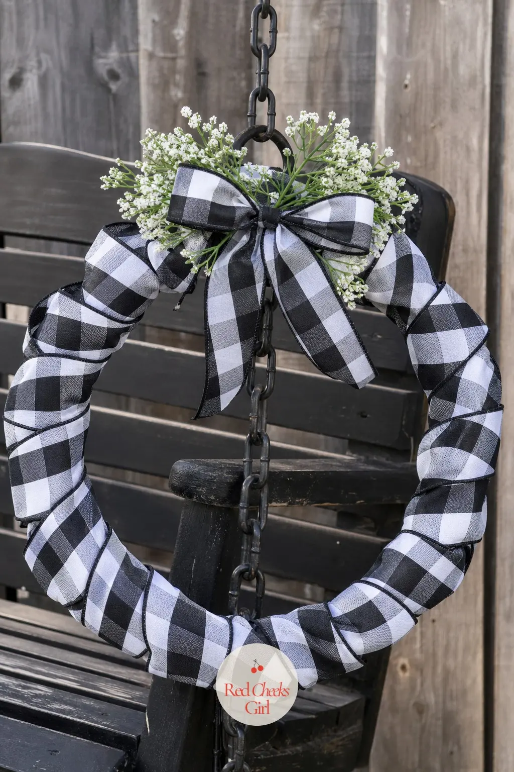 The Buffalo Check Ribbon Twist Wreath for the Porch Swing — Rather than bows or loops, this wreath twists one continuous length of black and white buffalo