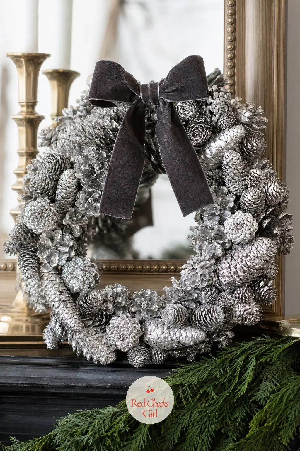 The Charcoal Velvet Bow and Silver Pinecone Wreath for the Game Night Mantel — Set above a mantel rather than on a door, this wreath needs to hold up to being