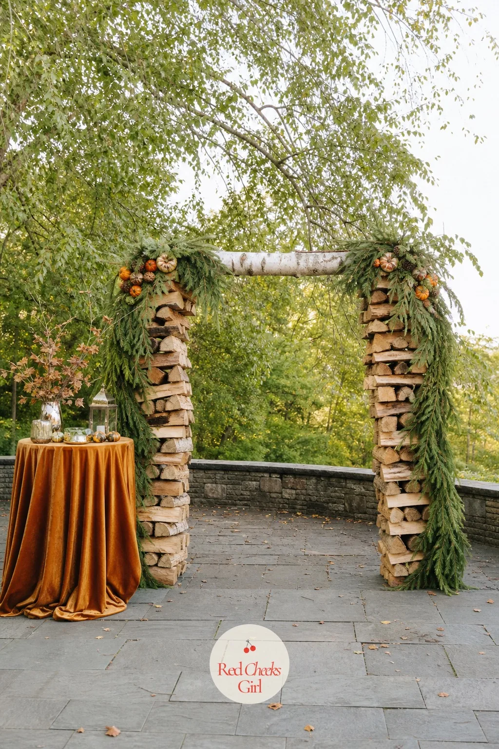Stacked Firewood Arch — A woodpile is not usually anyone's idea of romantic, until it is stacked deliberately into two neat columns holding up a single birch