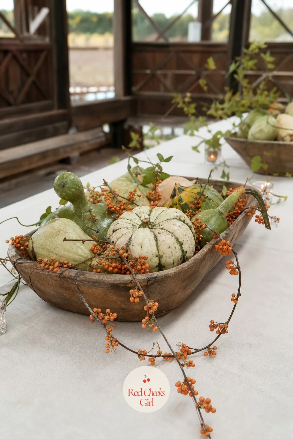 Gourds and Bittersweet Berries in Wooden Trugs — A trug is just a shallow garden basket, and it carries a harvest centerpiece better than any vase could.