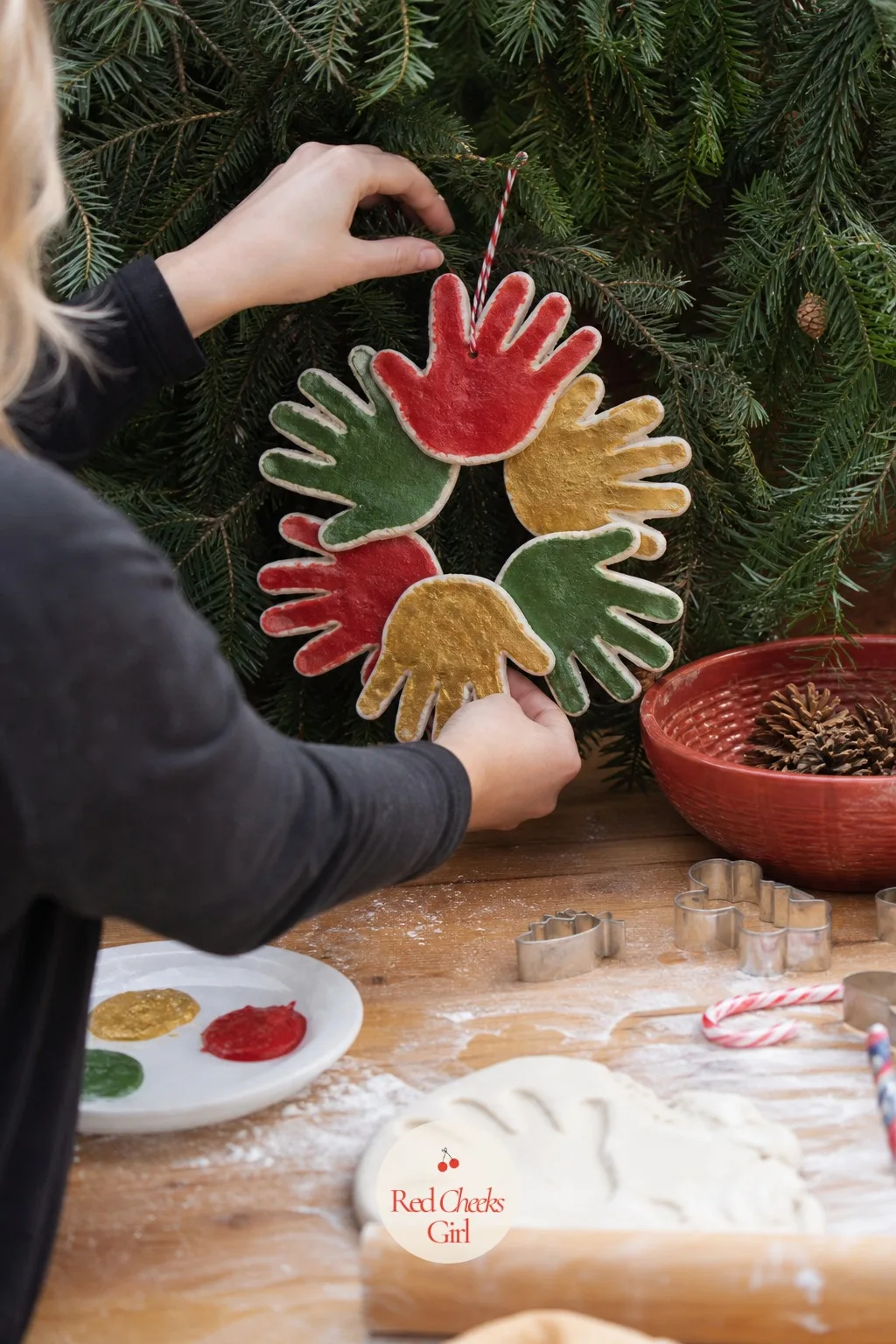 Family Handprint Wreath — One handprint is sweet, five arranged in a ring is something you will actually hang front and center. Salt dough christmas ornaments