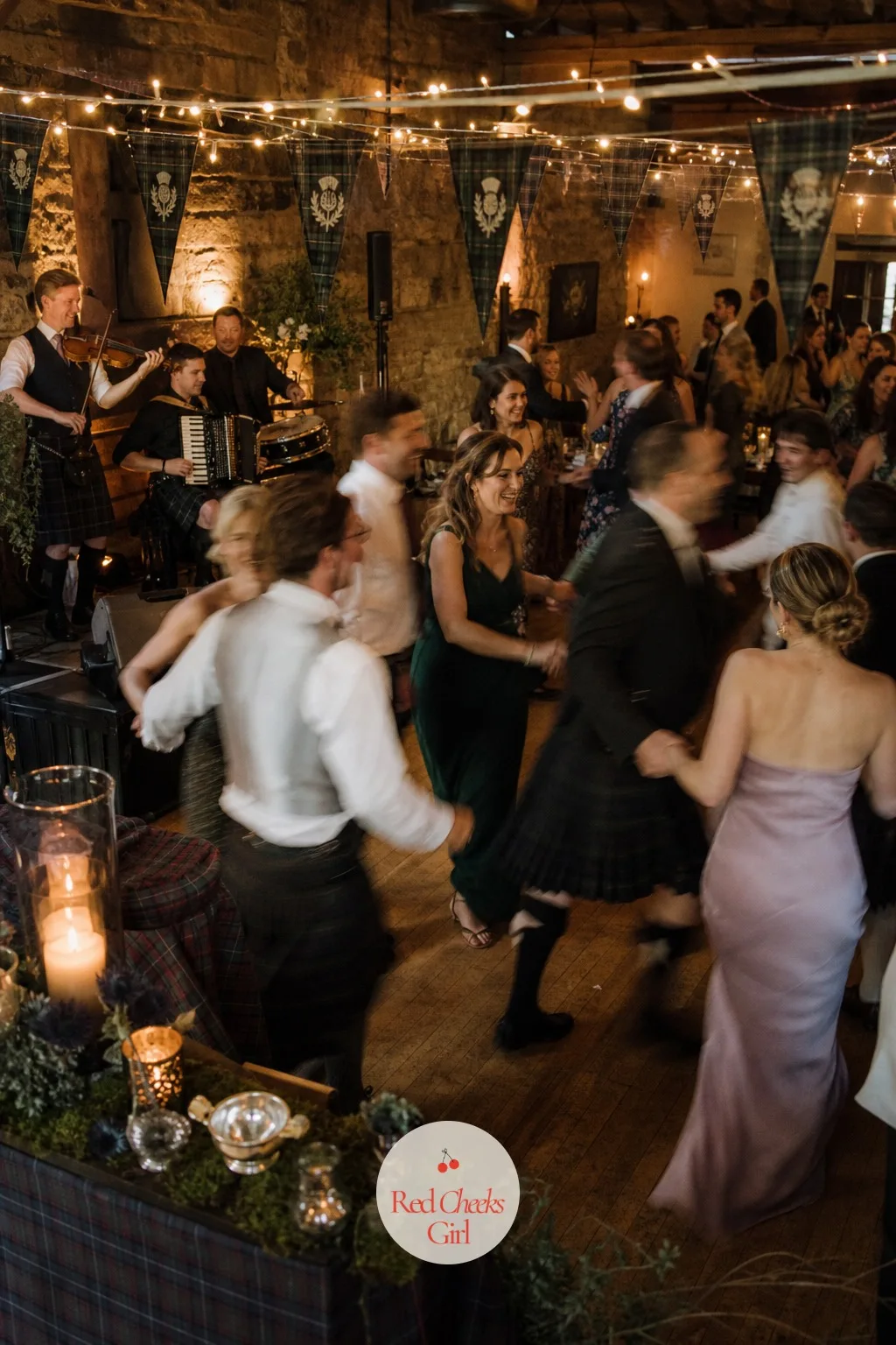 The Ceilidh Dance Floor — A DJ reading off a wedding hashtag never gets a room moving the way a fiddle and an accordion do, and this is the one place a