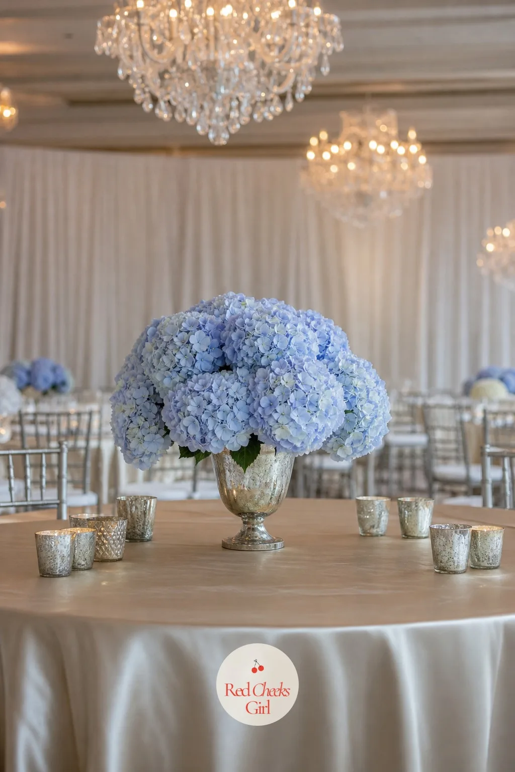 A Single Hydrangea Mound — One hydrangea head holds the volume of a dozen smaller flowers, which is exactly why this is the cheapest full-looking centerpiece
