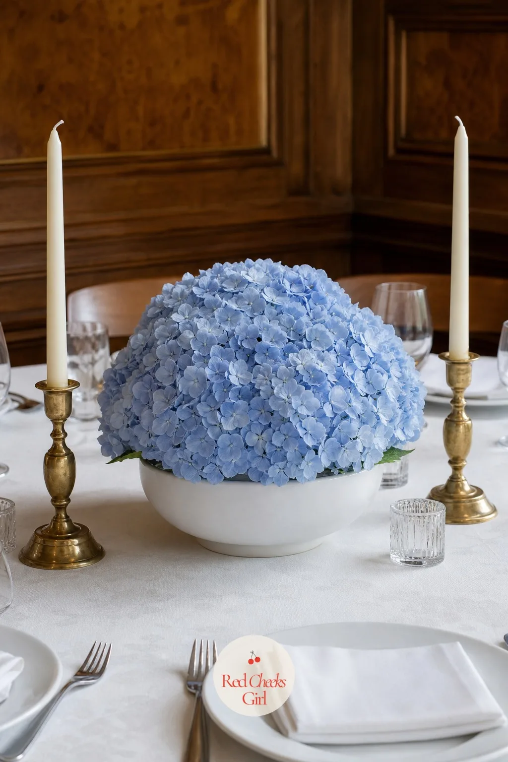 Single Hydrangea Mounds — Hydrangea heads are enormous for the money, which is exactly why one per table does the job that would otherwise need a dozen smaller