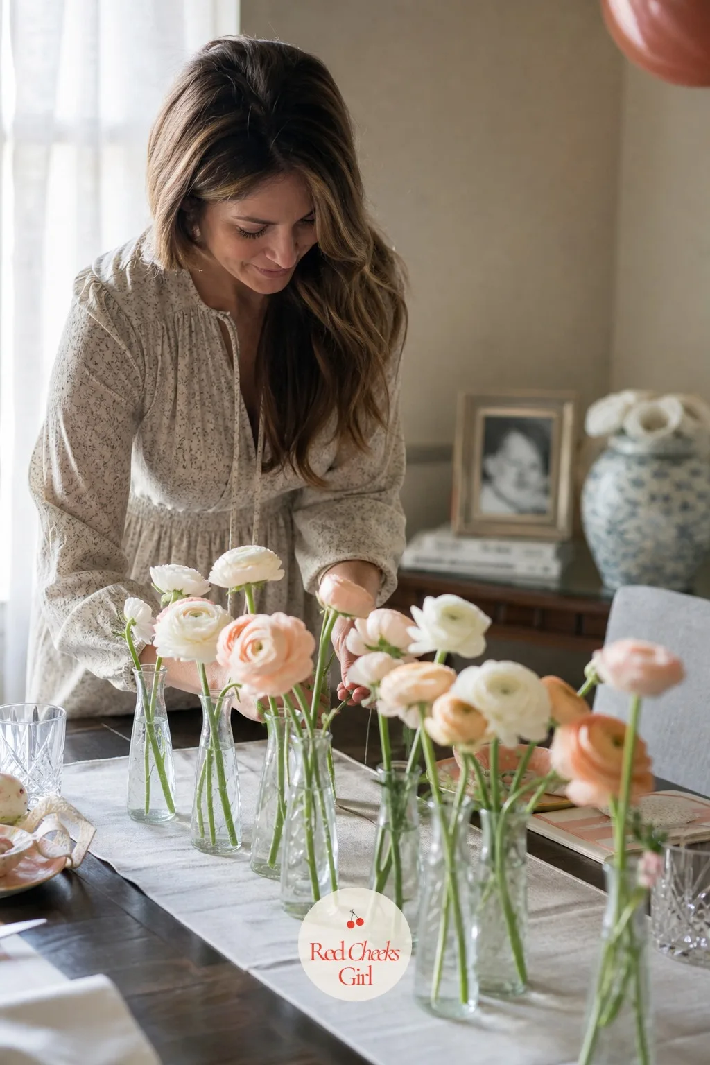Bud Vase Flowers — One large centerpiece hogs the whole table and blocks the view of the food behind it, which nobody wants at a party about looking at