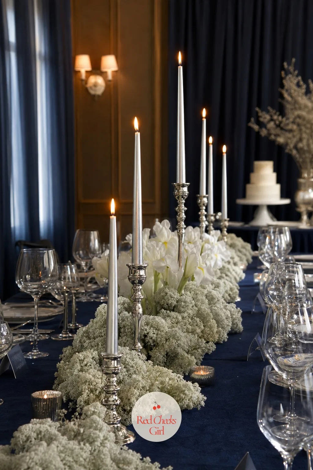 Silver Taper Candles Down the Table — Overhead lighting flattens a room by evening, and this is the quiet fix nobody has to switch on. Snow in love bridal