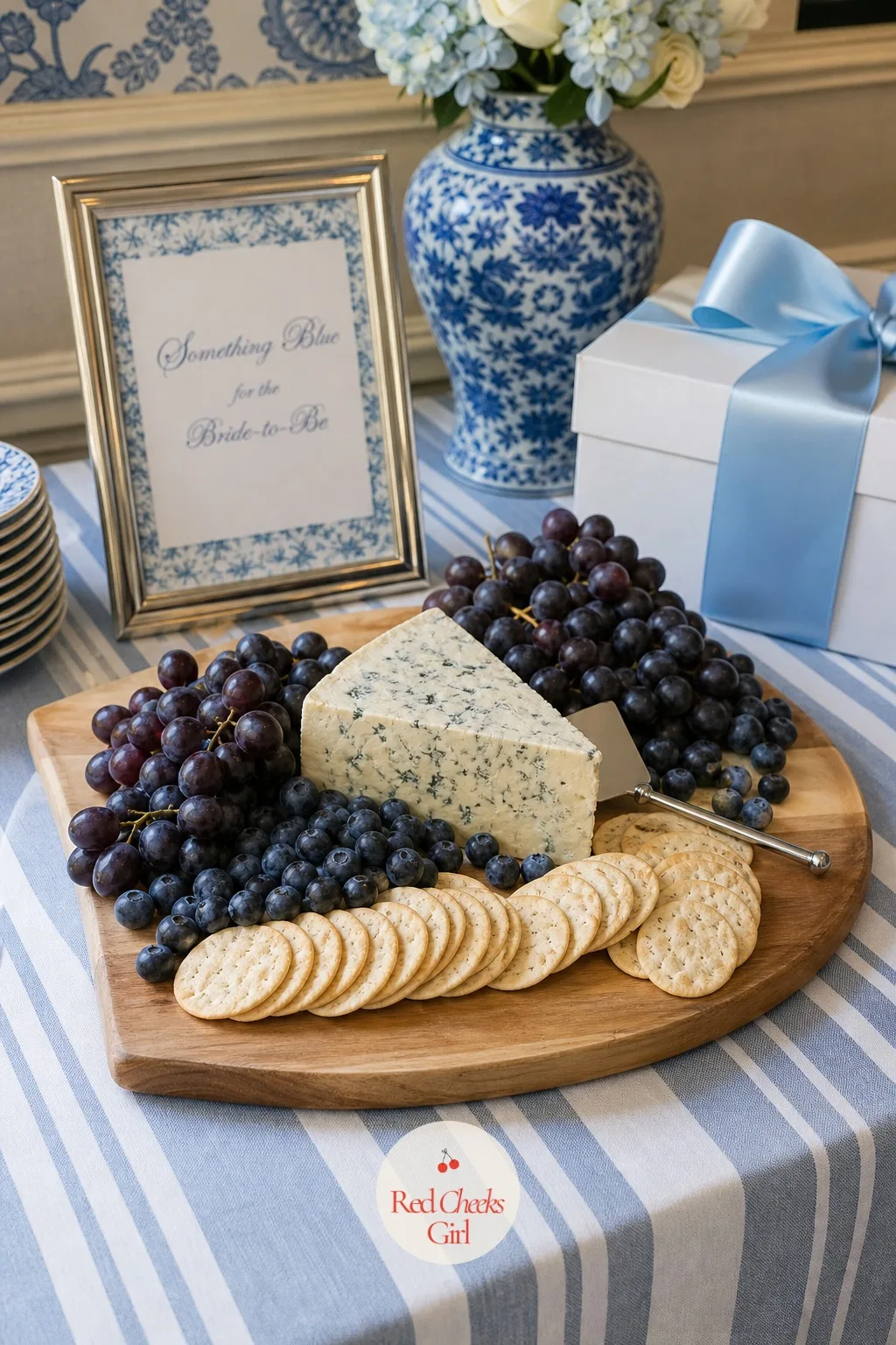 Blue Cheese and Berry Grazing Board — Away from the sweets, a savoury board gives guests something to eat before the cake, built around an actual wedge of blue
