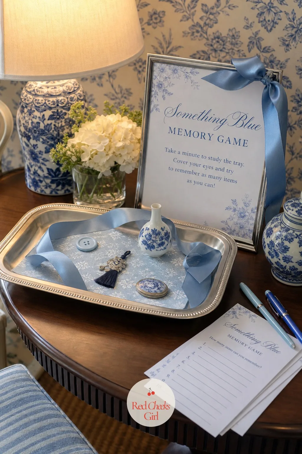 Something Blue Memory Tray Game — Set on a side table away from the food, a tray of small blue objects gives guests a reason to gather around and compete