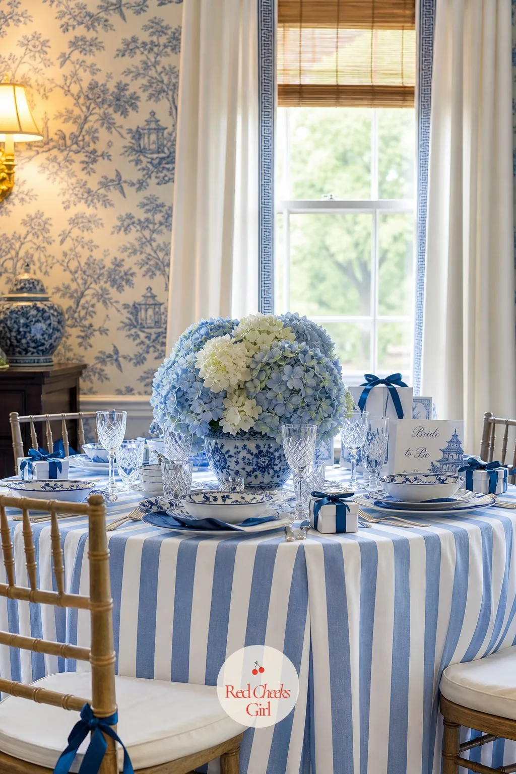 Striped Tablecloths — Under all the porcelain and the florals, the table itself needs a surface that holds its own, and a blue and white stripe does it without