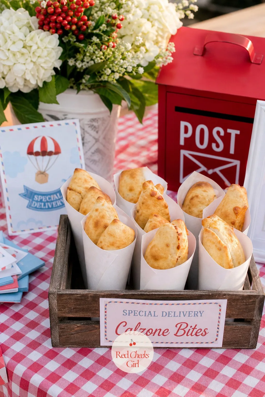 Baked Calzone Bites in Paper Cones — A full calzone is a lot to hand someone holding a drink and a gift bag. Special delivery baby shower theme