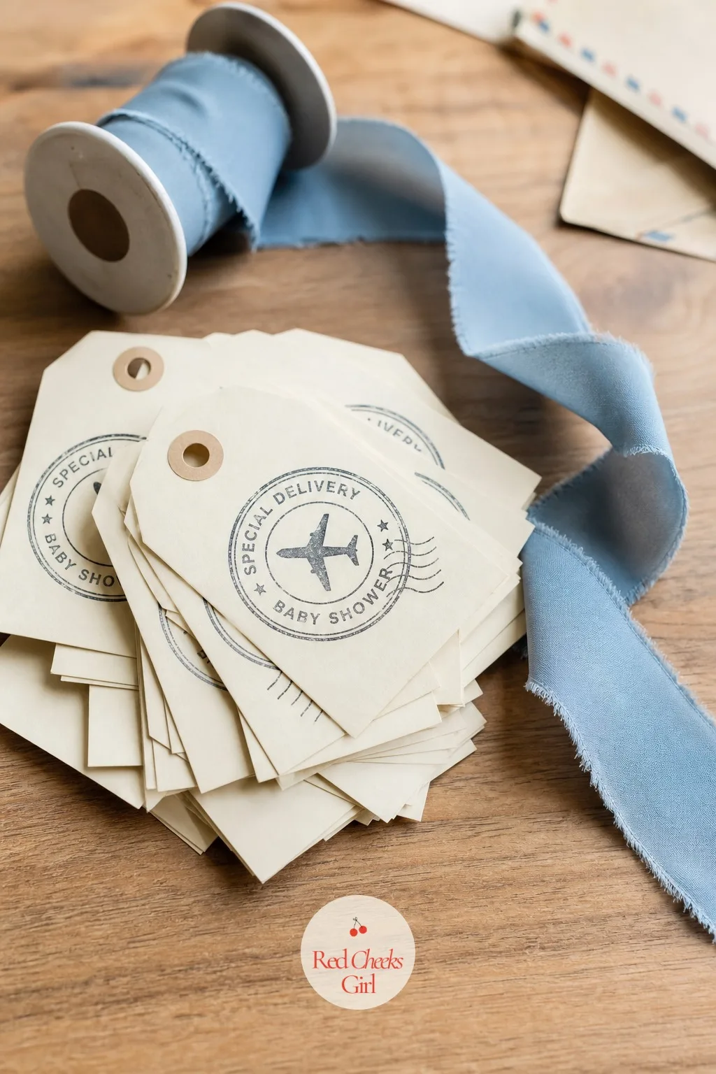 Passport Stamp Favor Tags — A plain thank you tag disappears the moment it is tied on. Special delivery baby shower theme