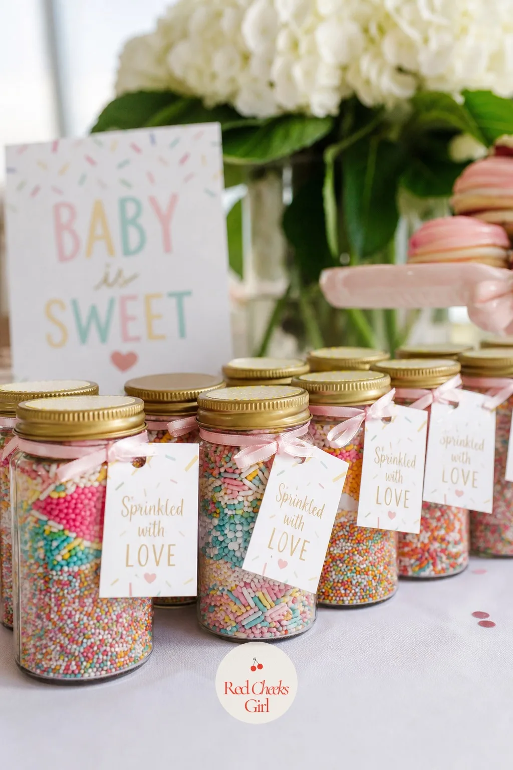 Sprinkle Jar Favors — A favor only earns its keep if it is something she would actually buy herself, and a small jar of real sprinkles does exactly that