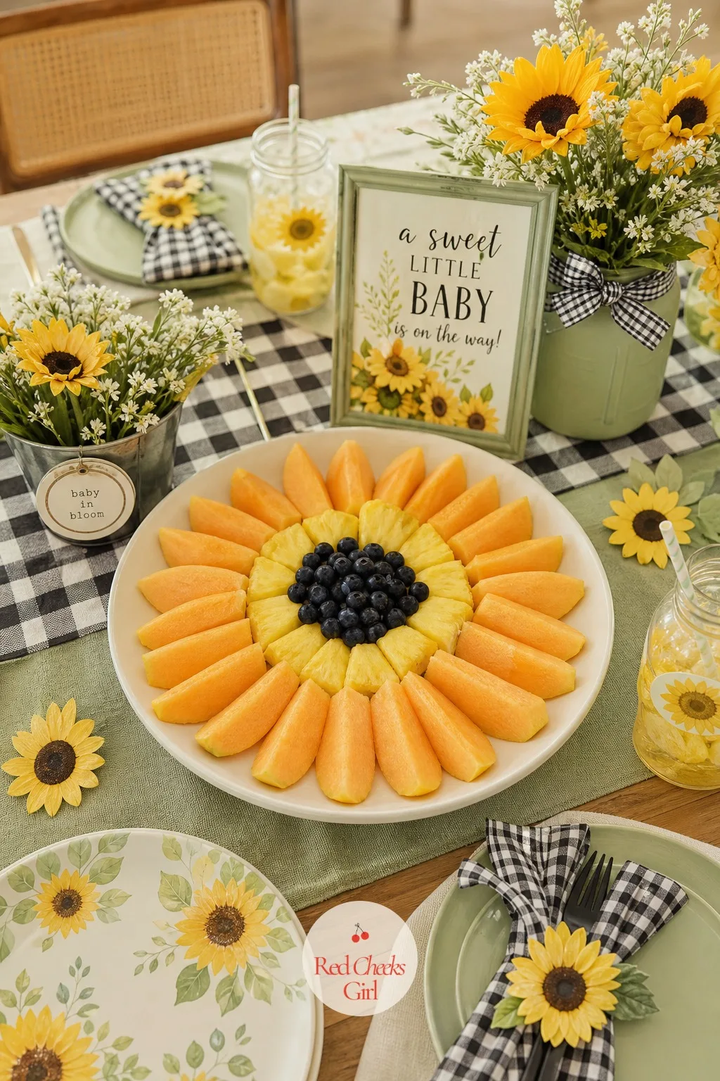 Sunflower-Shaped Fruit Platter — A fruit tray always gets eaten, but a flat scatter of melon chunks does nothing for the table. Sunflower theme baby shower