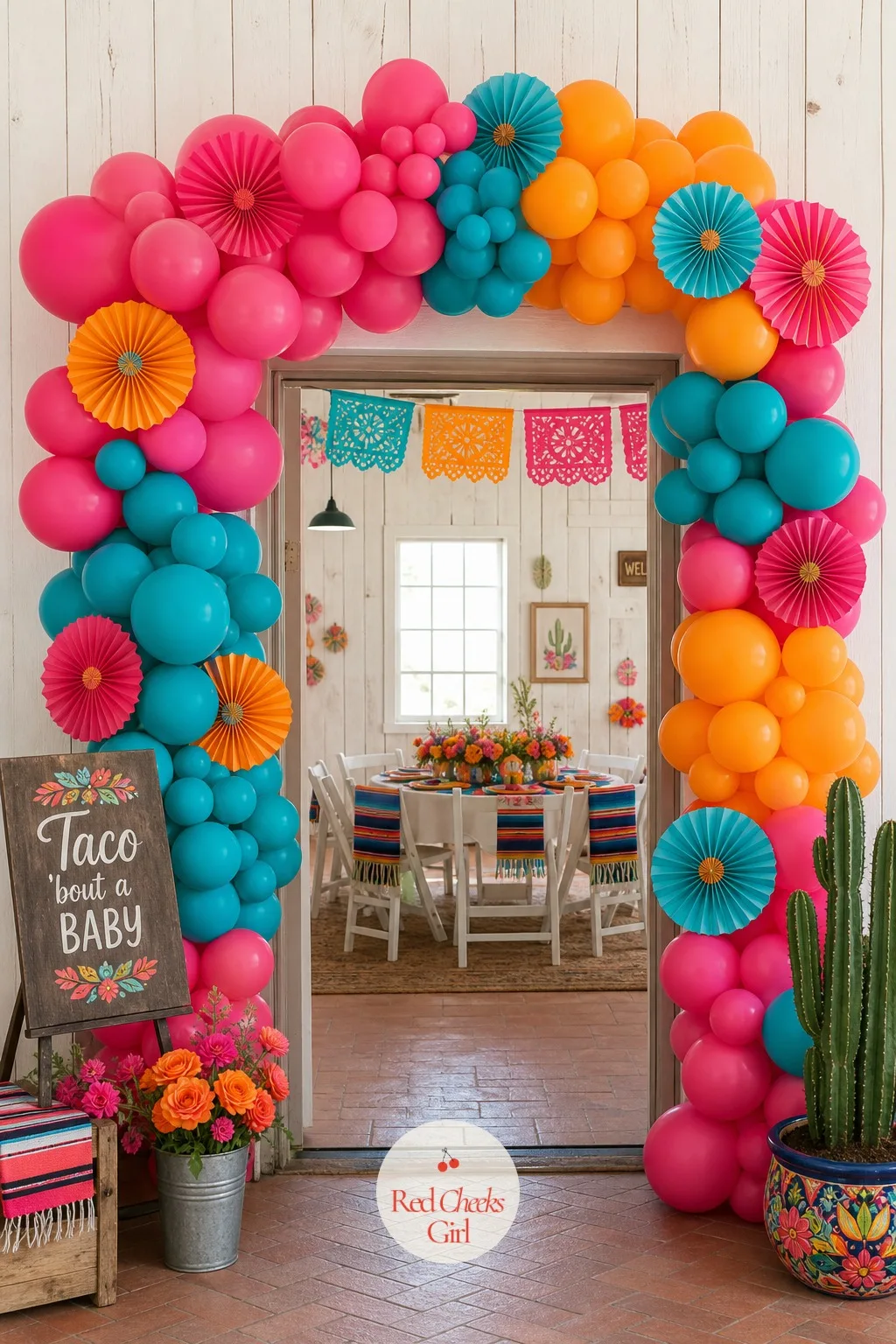 Balloon Arch in Fiesta Brights — An empty doorway is the easiest thing in the room to fix and the one guests walk straight past if it stays bare. Taco bout a