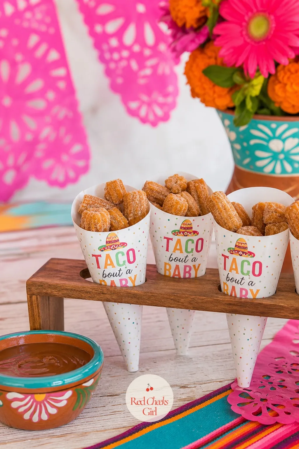 Churro Bites in a Paper Cone Stand — Full size churros are messy to eat while standing and holding a drink in the other hand. Taco bout a baby shower ideas