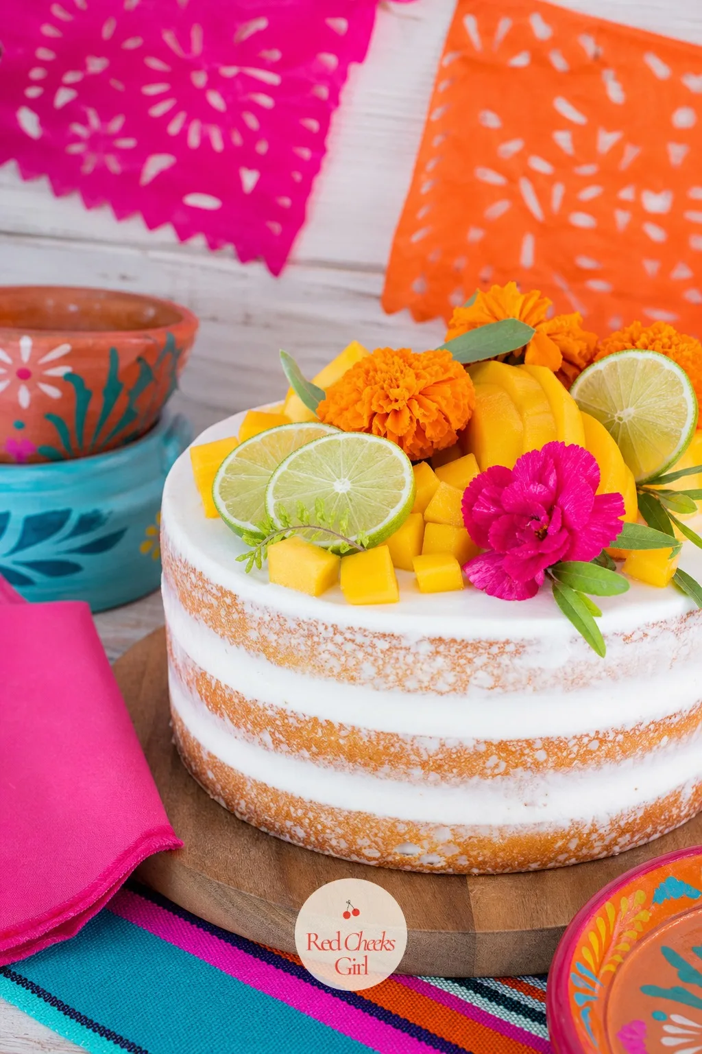 Naked Fiesta Cake With Fresh Fruit — Fondant feels fussy for a daytime party where everyone is standing around with a plate in hand. Taco bout a baby shower
