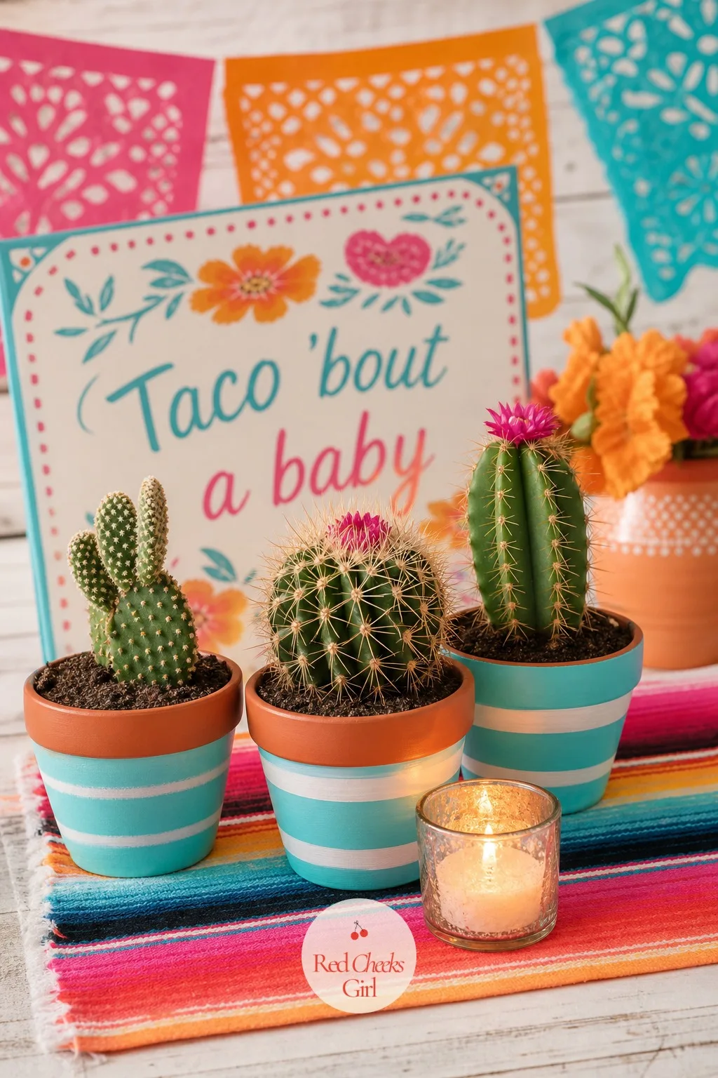 Potted Cactus Centerpiece in Painted Terracotta — Real cacti feel permanent for a party that lasts an afternoon, and sourcing enough of them for every table