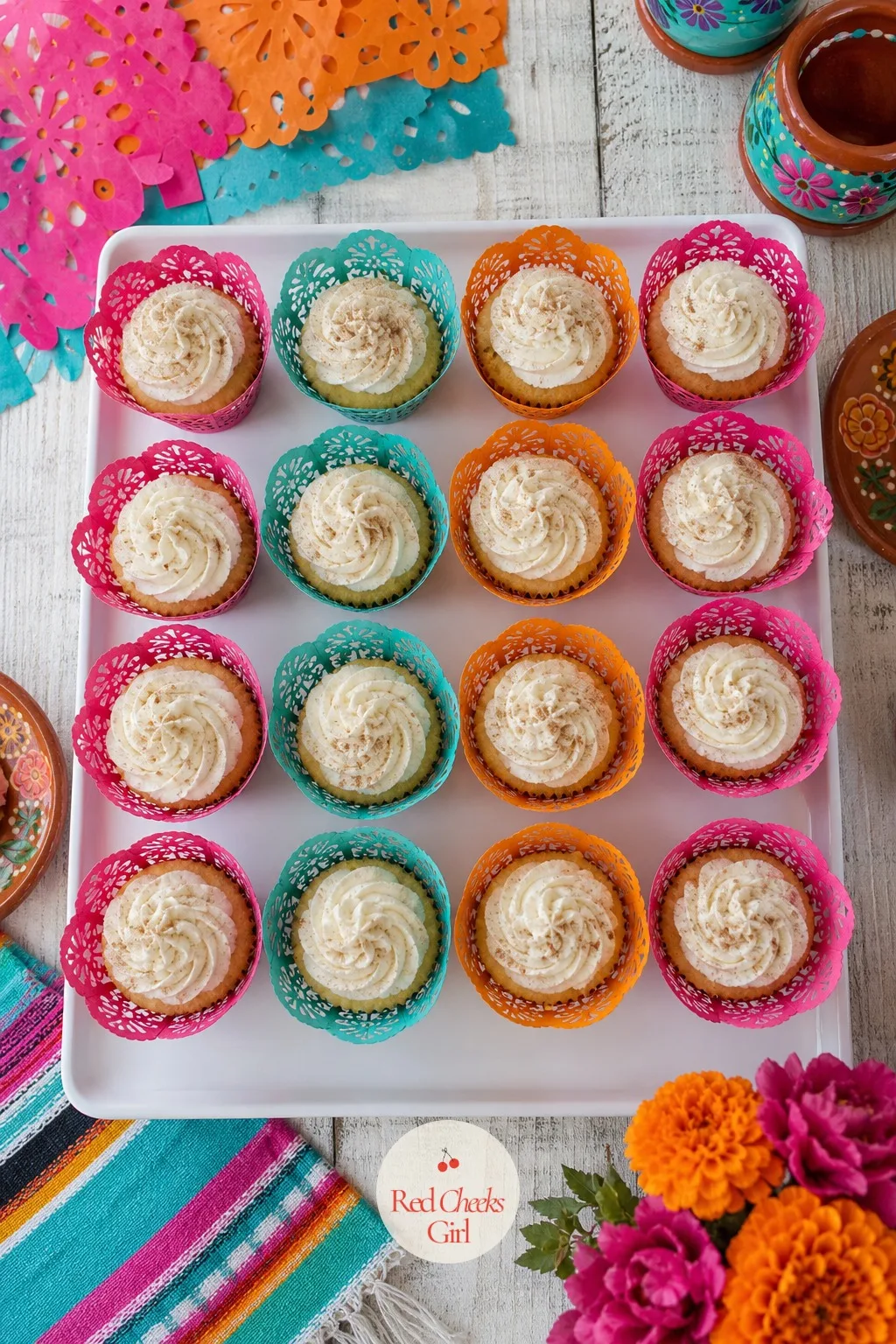 Tres Leches Cupcakes in Papel Picado Wrappers — Plain white liners disappear into a table already full of color. Taco bout a baby shower ideas