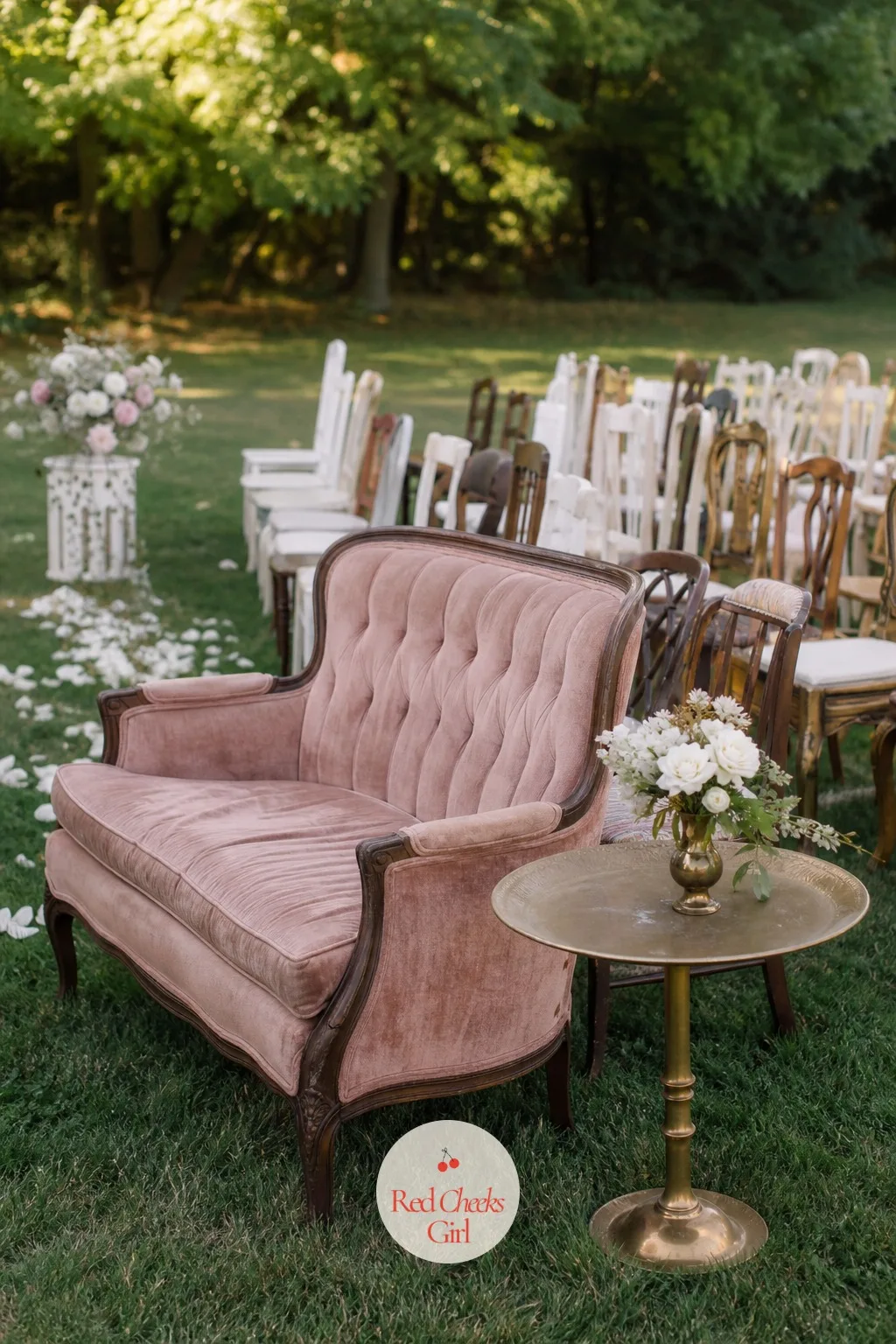 An Antique Settee for the Front Row — Rows of identical folding chairs look rented even when every other piece is not. Thrifted wedding decor