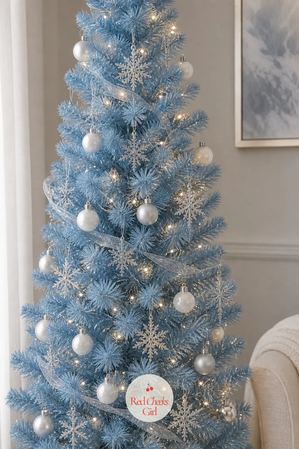 The Powder Blue Pencil — A slim artificial pencil tree in powder blue, the softest and coolest palette here, finished with pearl white balls and silver