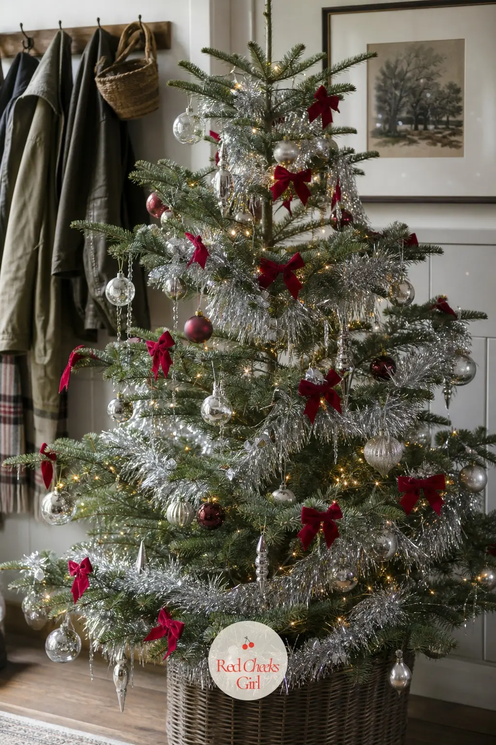 The Sparse Silver Tinsel Fir — A sparse, airy real tree, the kind with visible gaps between branches, which is exactly what makes chunky silver tinsel work