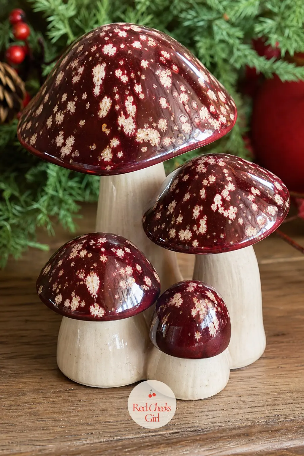 A Cluster of Painted Ceramic Mushrooms in Burgundy and Cream — Five or six ceramic mushrooms, caps glazed in burgundy with cream speckles and plain cream