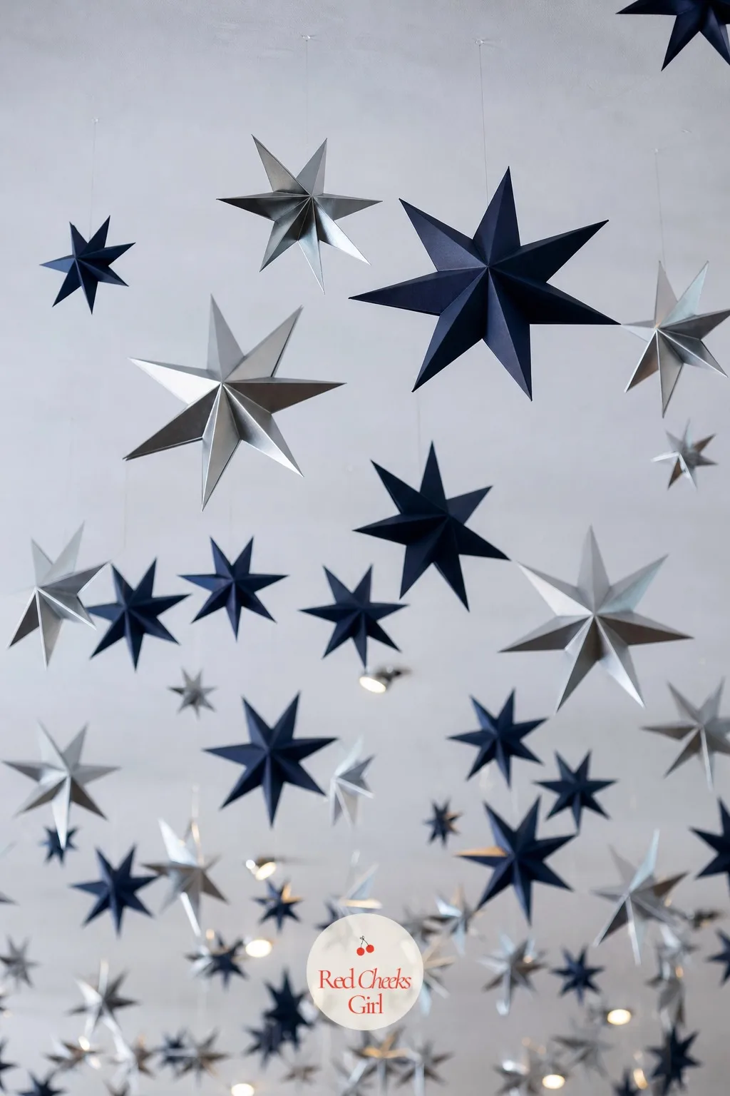 The Paper Star Ceiling — An empty ceiling flattens a room no matter how good the table below looks. Twinkle twinkle gender reveal