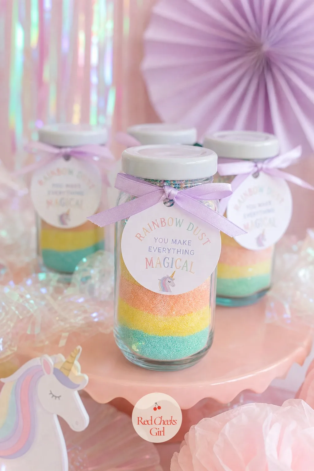 Rainbow Dust Favor Jars — A favor bag full of plastic toys gets left behind by the door within a week. Unicorn birthday party ideas