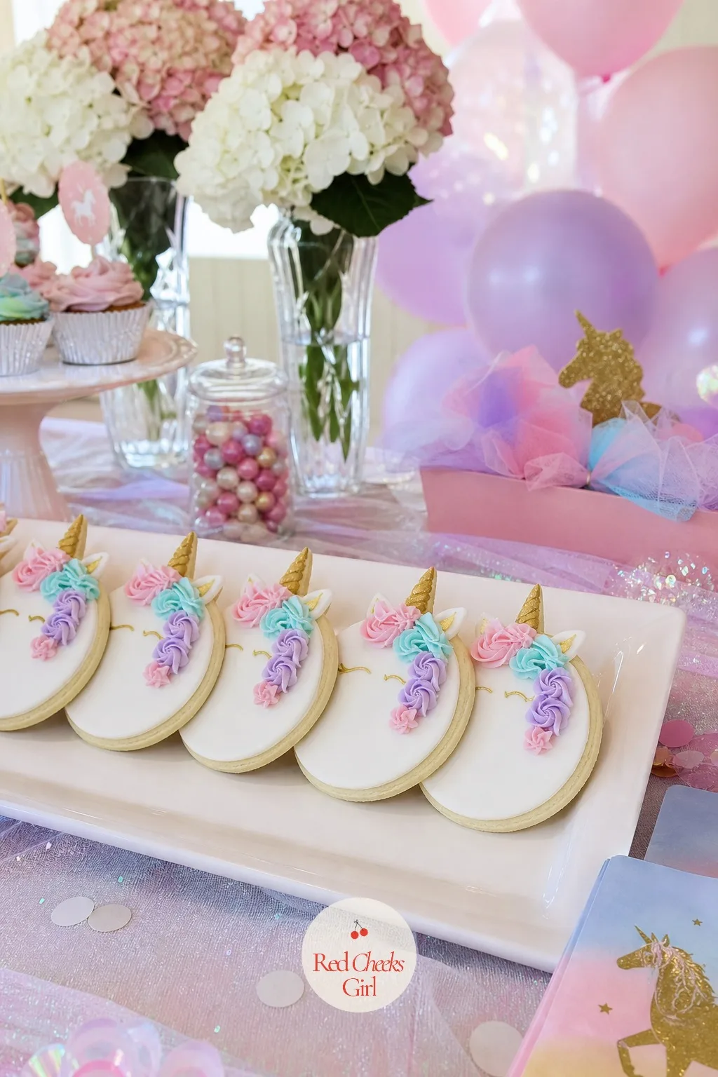 Unicorn Mane Cookies — Cookies do the work a cake cannot: guests can hold one without a fork, and they stack beautifully on a stand for the table to look