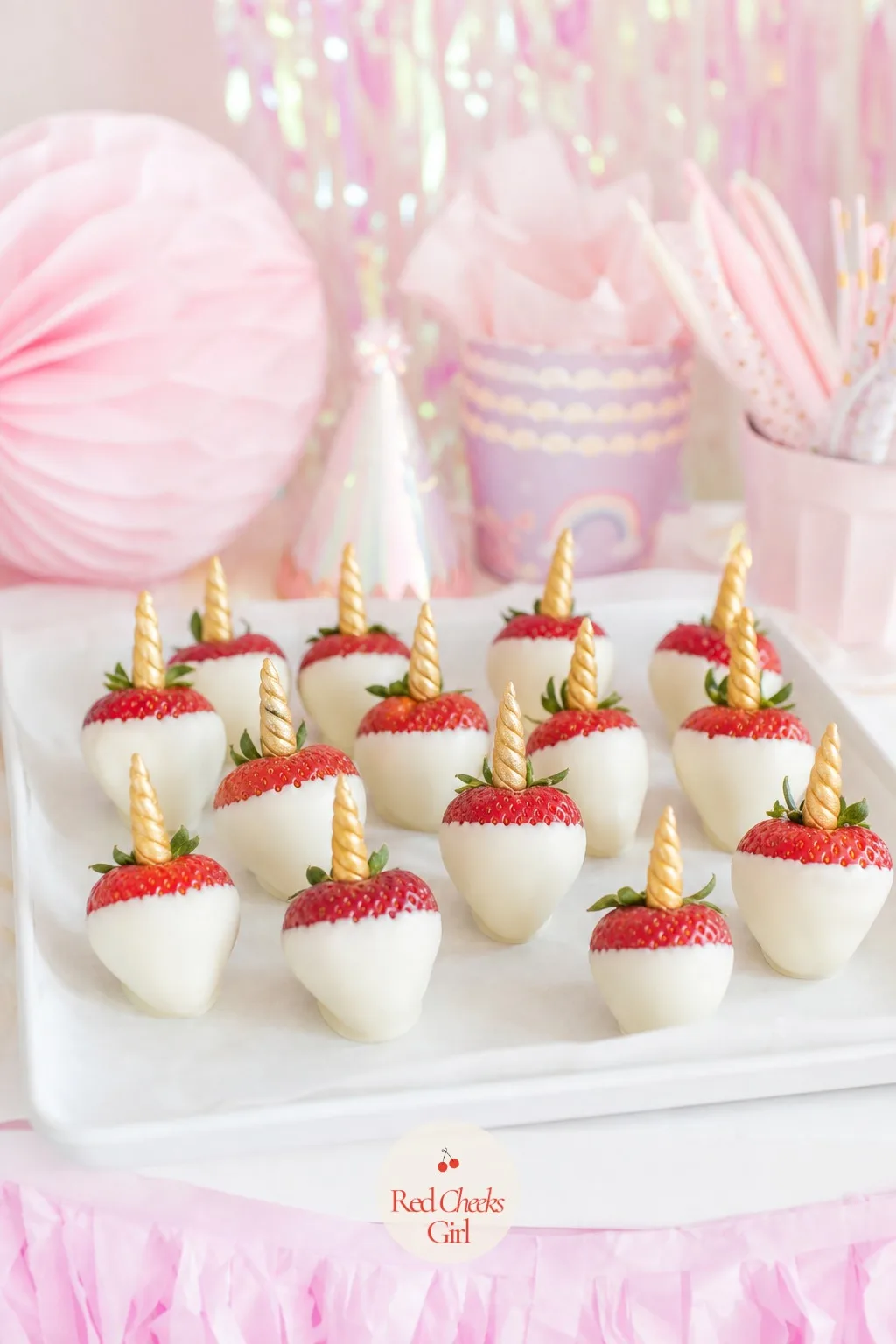 White Chocolate Dipped Strawberries With Fondant Horns — Somewhere between the cookies and the cake, this one gives the fruit-only guest something to reach for