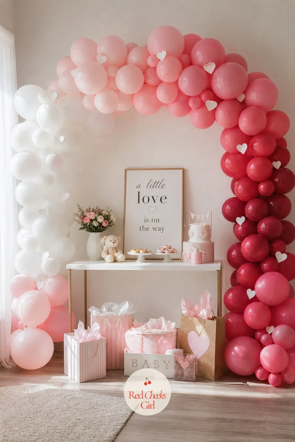 Pink-Red Ombre Heart Balloon Arch — This is the thing every photo from the party ends up standing in front of, so it is worth the one real splurge on the list.