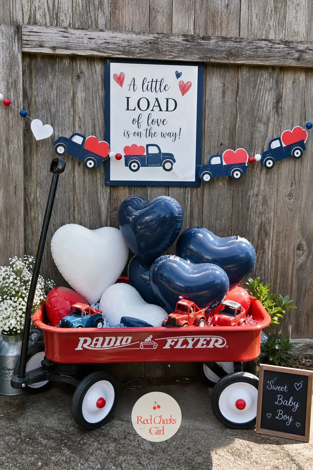 Red Wagon Photo Corner — For a boy shower, trade the armchair for something sturdier: a vintage-style red wagon filled with navy and white heart balloons, a