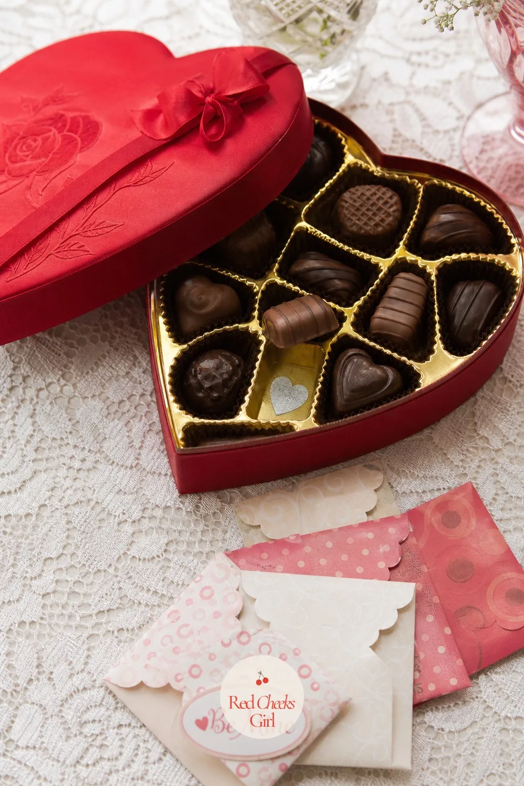 Box of Chocolates — A fancy box of chocolates holds more than candy here: slip tiny heart stickers under three or four pieces before anyone sits down, and keep