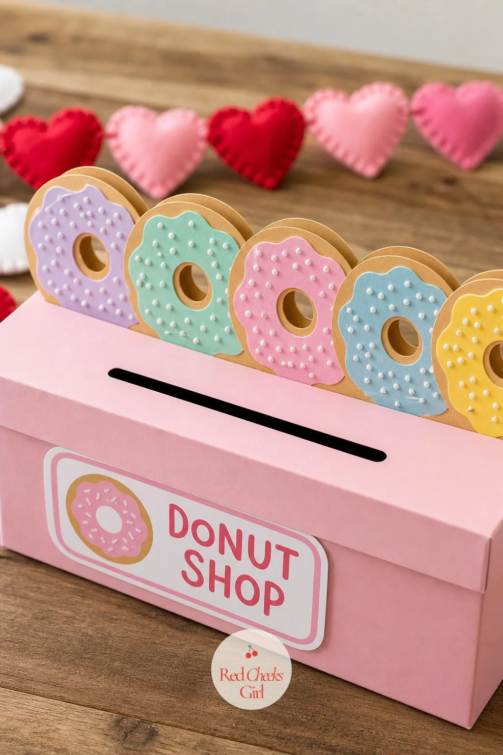 Mini Donut Shop Box — A row of paper donuts along the lid does more visual work than almost any single big shape could. Valentine box ideas for school