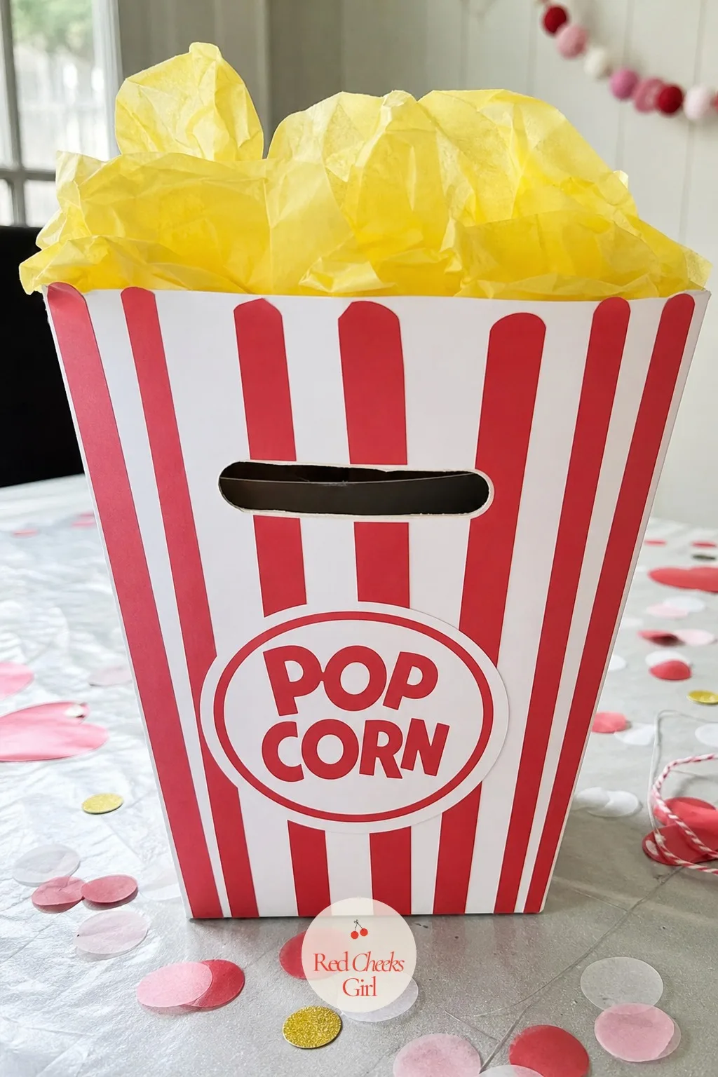 Movie-Night Popcorn Bucket — A striped box reads as a popcorn bucket the second it is wrapped, before a single extra piece goes on. Valentine box ideas for