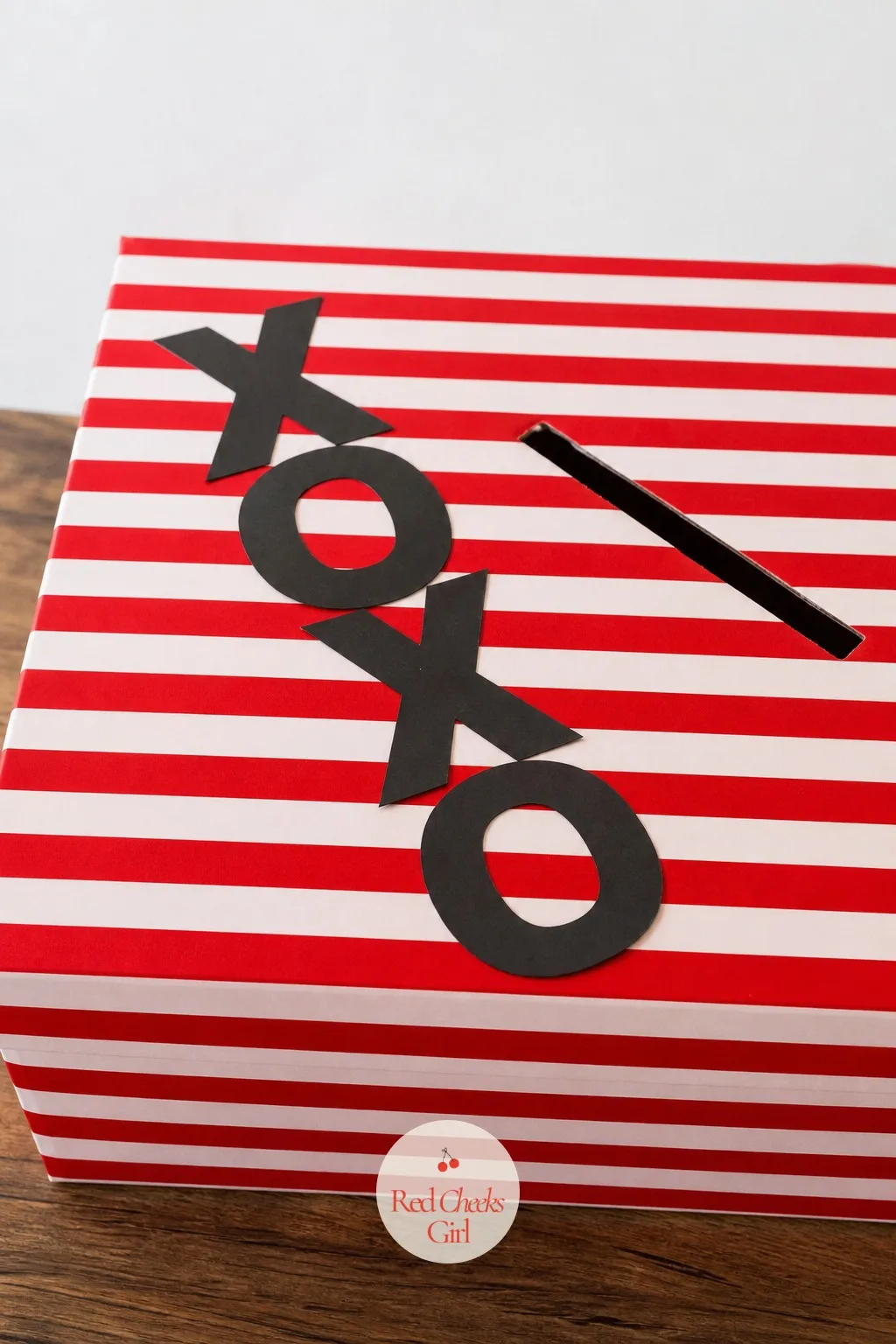 XOXO Stripe Box — Stripes and four big letters cover a lot of box with very little fuss. Valentine box ideas for school