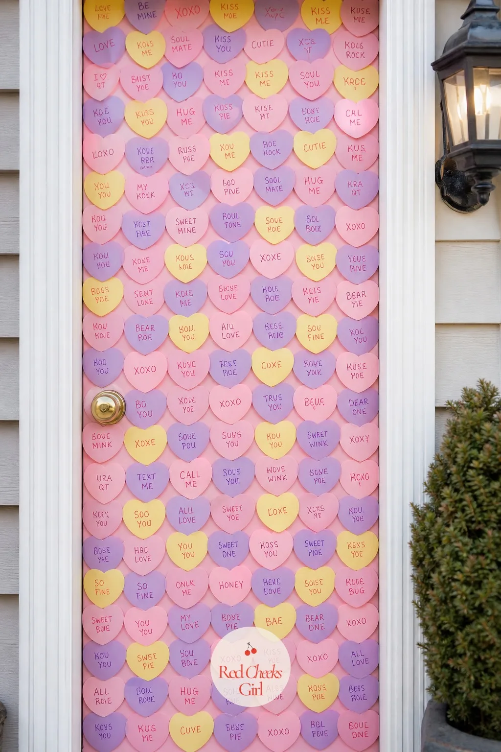 Door Covered in Conversation Hearts — A door that looks good from across the street and reads even better close up. Valentine door decorations