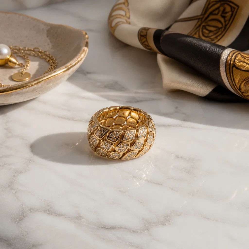 Gold Snake Ring — A wife who already reaches for gold every morning does not need another plain band, she needs one ring the whole hand notices. Valentine