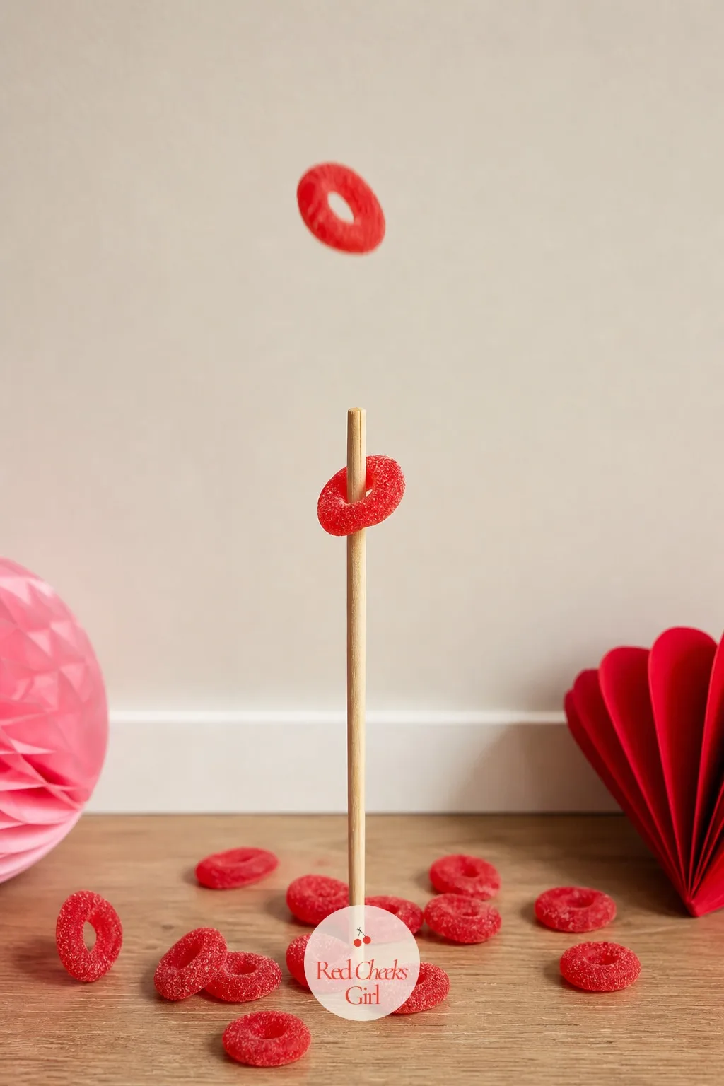 Put a Ring on It — Across the room, a thrown gummy ring looks easy to catch on a chopstick. Valentine party games