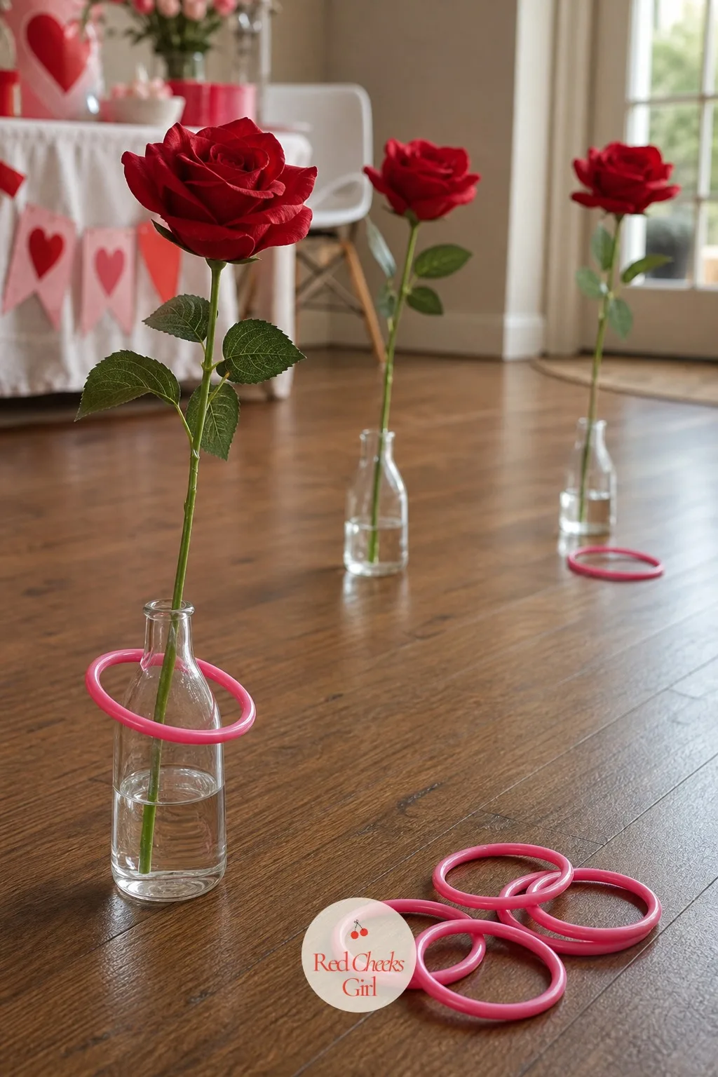 Ring Around the Roses — A row of fabric roses standing in bud vases looks almost too pretty to turn into a target, which is exactly the point. Valentine party