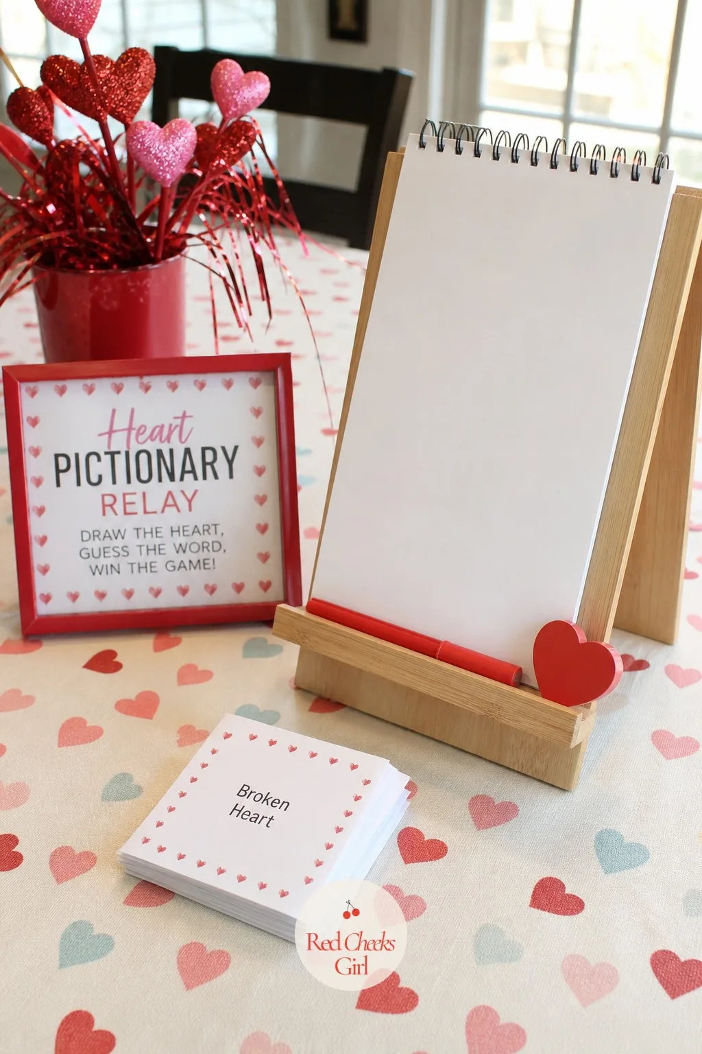 Heart Pictionary Relay — Split into teams, fill a bowl with Valentine-themed words and phrases, candlelight dinner, love letter, broken heart, and send one