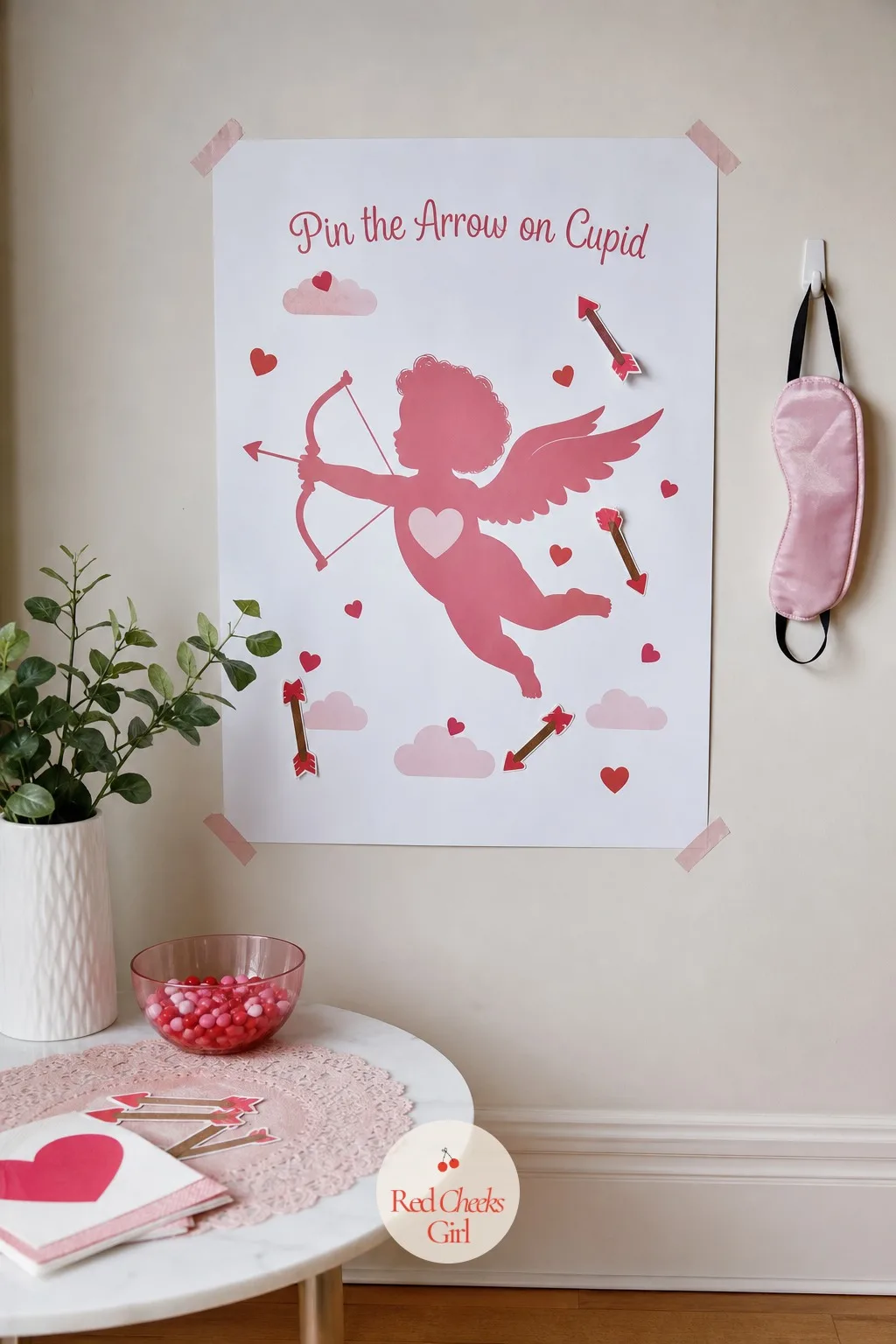 Pin the Arrow on Cupid — The oldest trick in the book still works because blindfolds are funny. Valentine's day party games