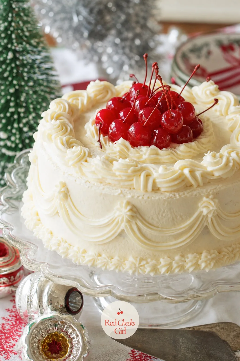 Cherry-Topped Vintage Christmas Cake — Cherries on a cake read as retro before anyone even tastes it, that glossy, slightly too-red colour that no modern
