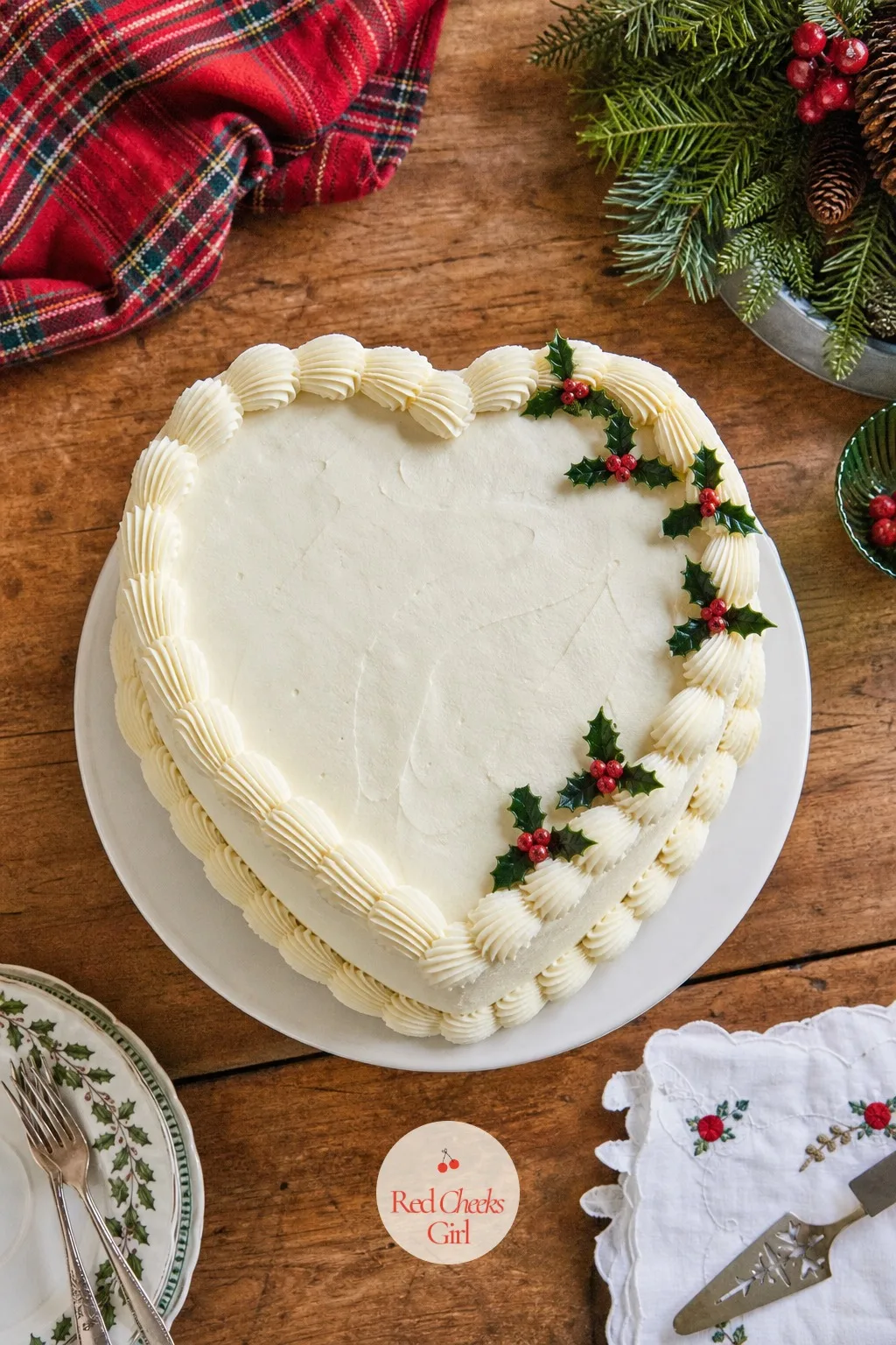 Heart Vintage Cake With Holly — A heart tin changes everything about how a cake reads, warmer and less formal than a round one, which is exactly why this shape