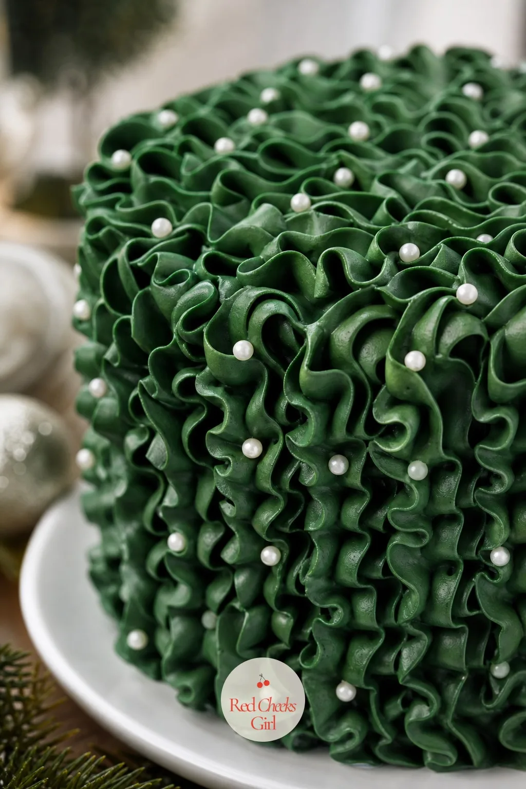 Pine Green Piped Cake With Pearls — Green is the colour most vintage cakes skip, which is exactly why it stands out on a dessert table crowded with red and