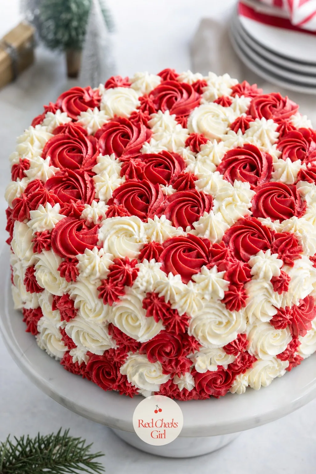 Red and White Vintage Piped Cake — This is the one you picture first when someone says vintage Christmas cake: a cream base wrapped in alternating red and