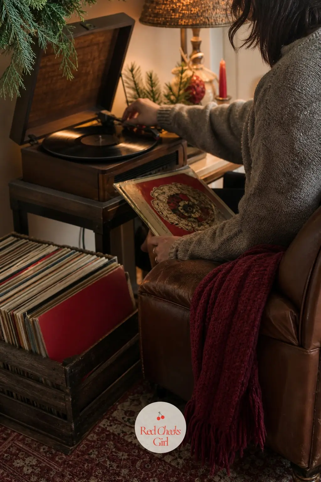 The Record Player Corner, Vinyl Stacked and Waiting — An armchair sits angled toward a vintage-style record player, a crate of Christmas vinyl stacked beside