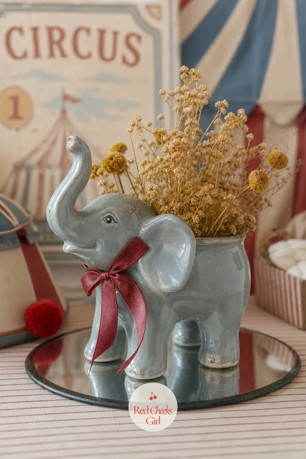 Ceramic Elephant Planter Centerpiece — One good object beats five small ones on a crowded guest table, and a glazed ceramic elephant earns its spot. Vintage